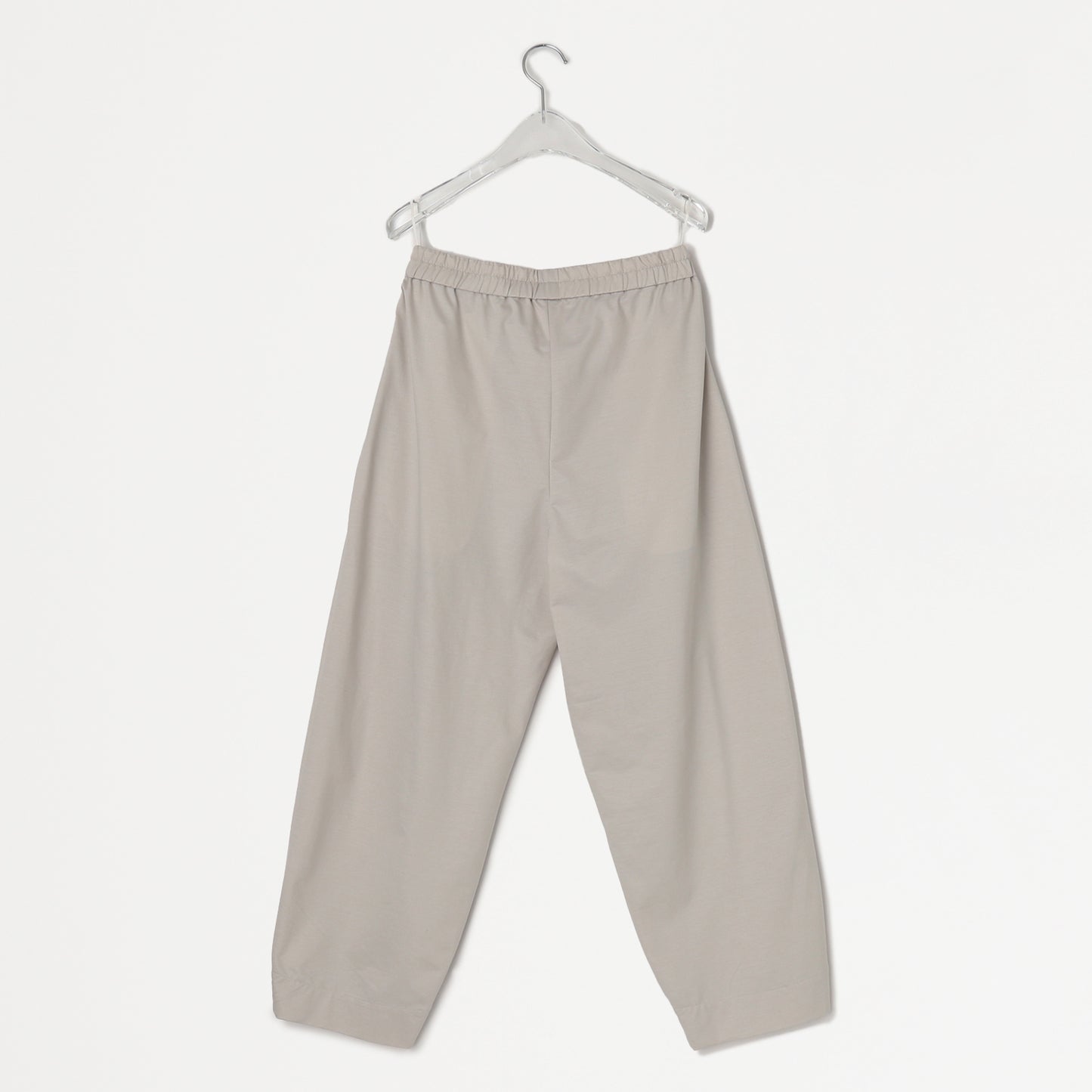 Shiny high-gauge relaxed pants